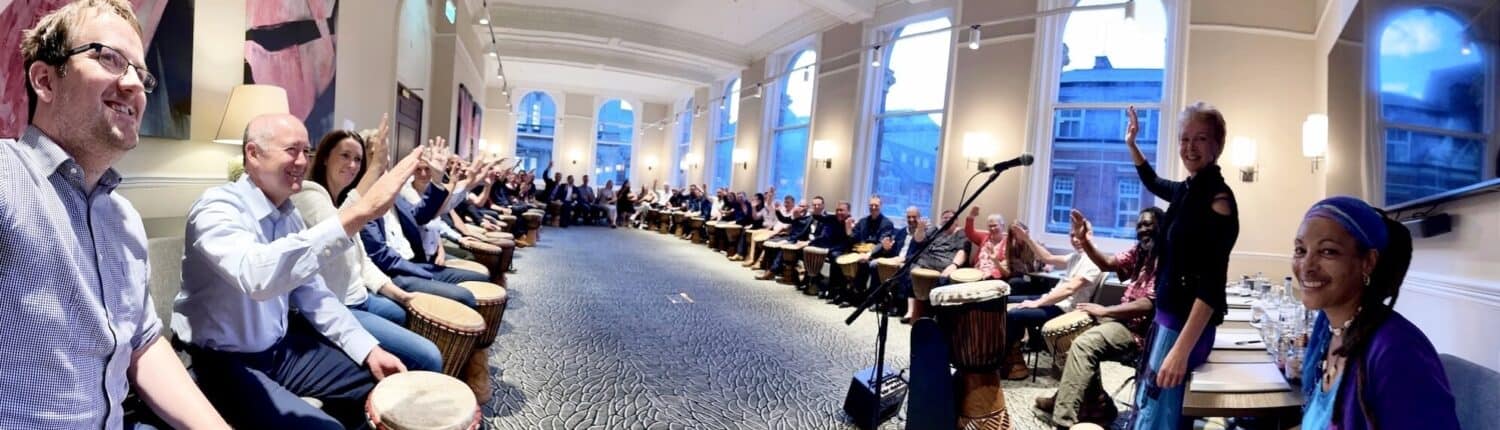 Corporate drumming team building session with Primal Sound