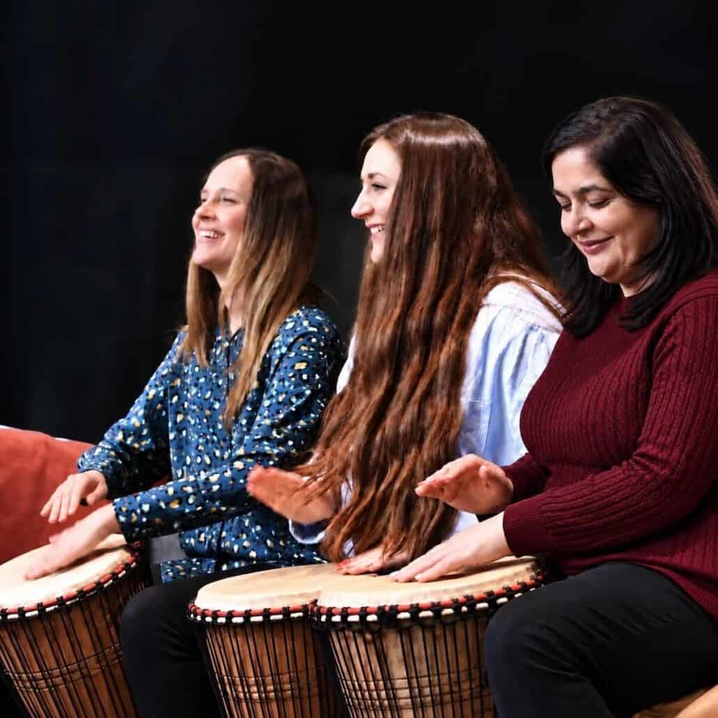Women Drumming at Primal Sound wellbeing session for Avison Young. Women Drumming at Primal Sound wellbeing session for Avison Young.